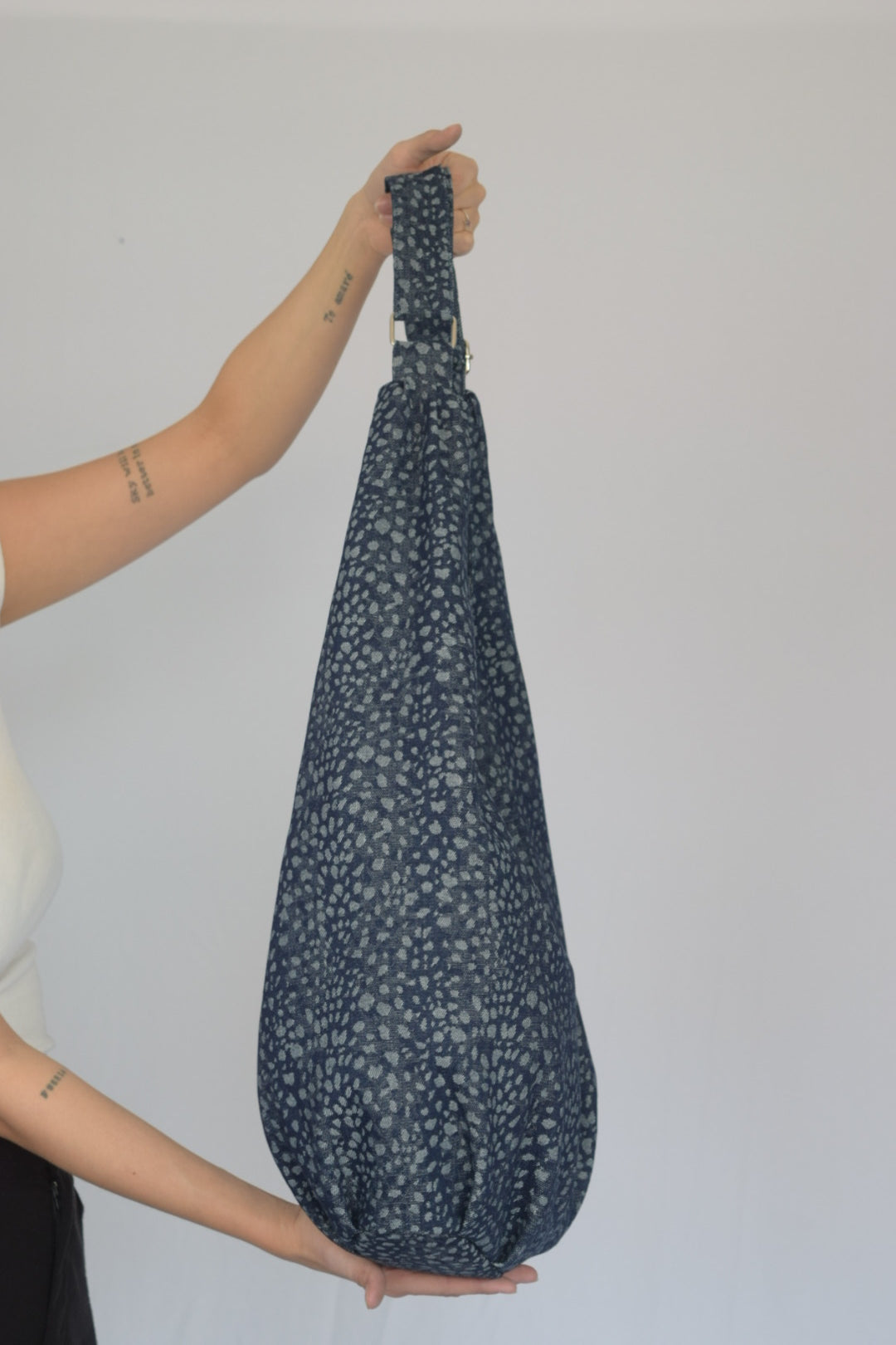 Bolso denim atigrado