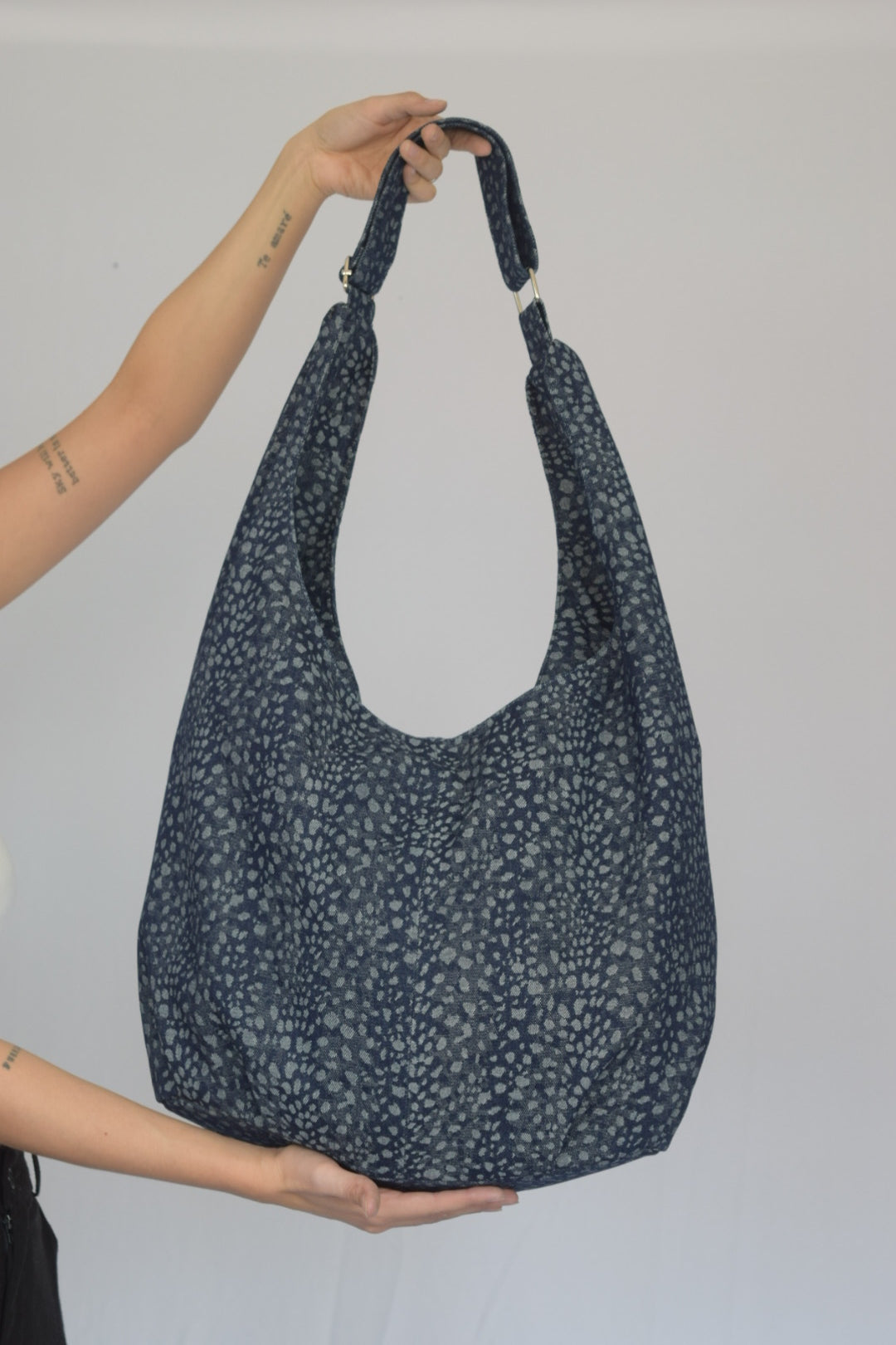 Bolso denim atigrado